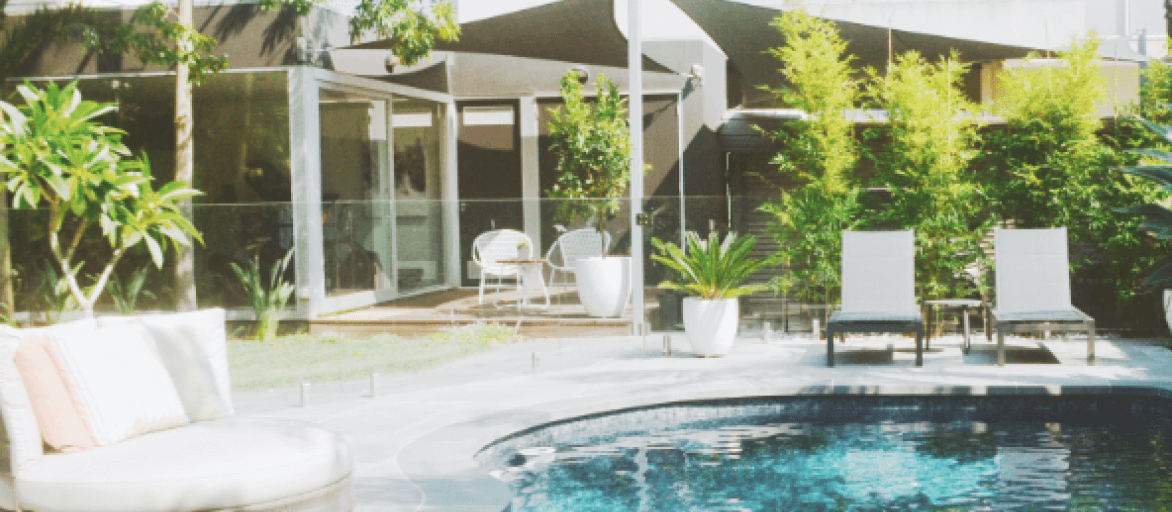 Curved pool backyard